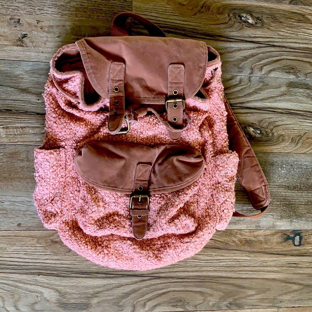 Brown suede & pink rose furry back pack.